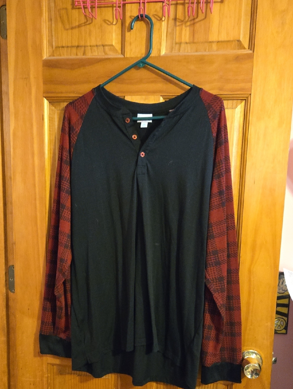 LuLaRoe Black Body Long-Sleeve Top with Red Plaid Sleeves